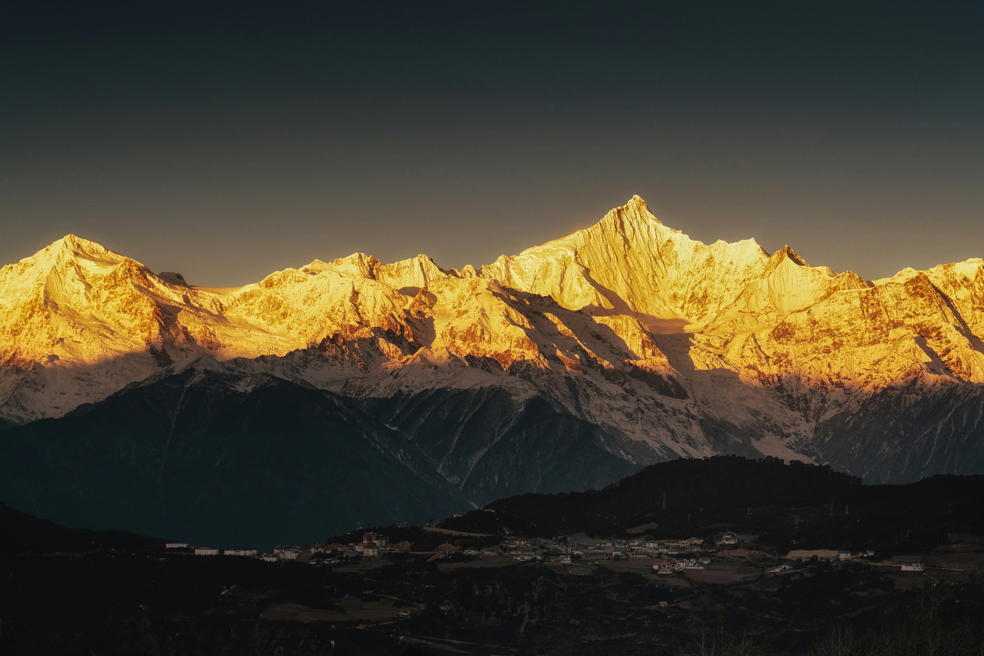 Golden snow mountain sunrise in Yunnan