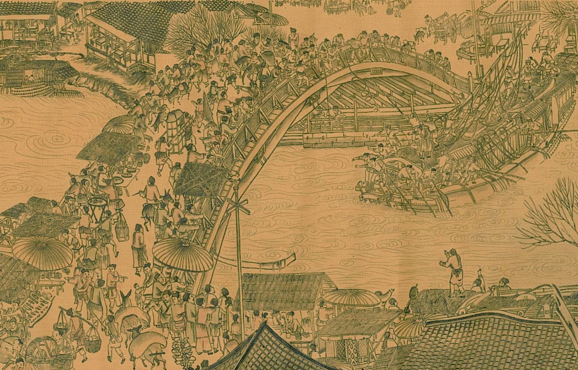 Crowded Rainbow Bridge and a vessel manoeuvring beneath it