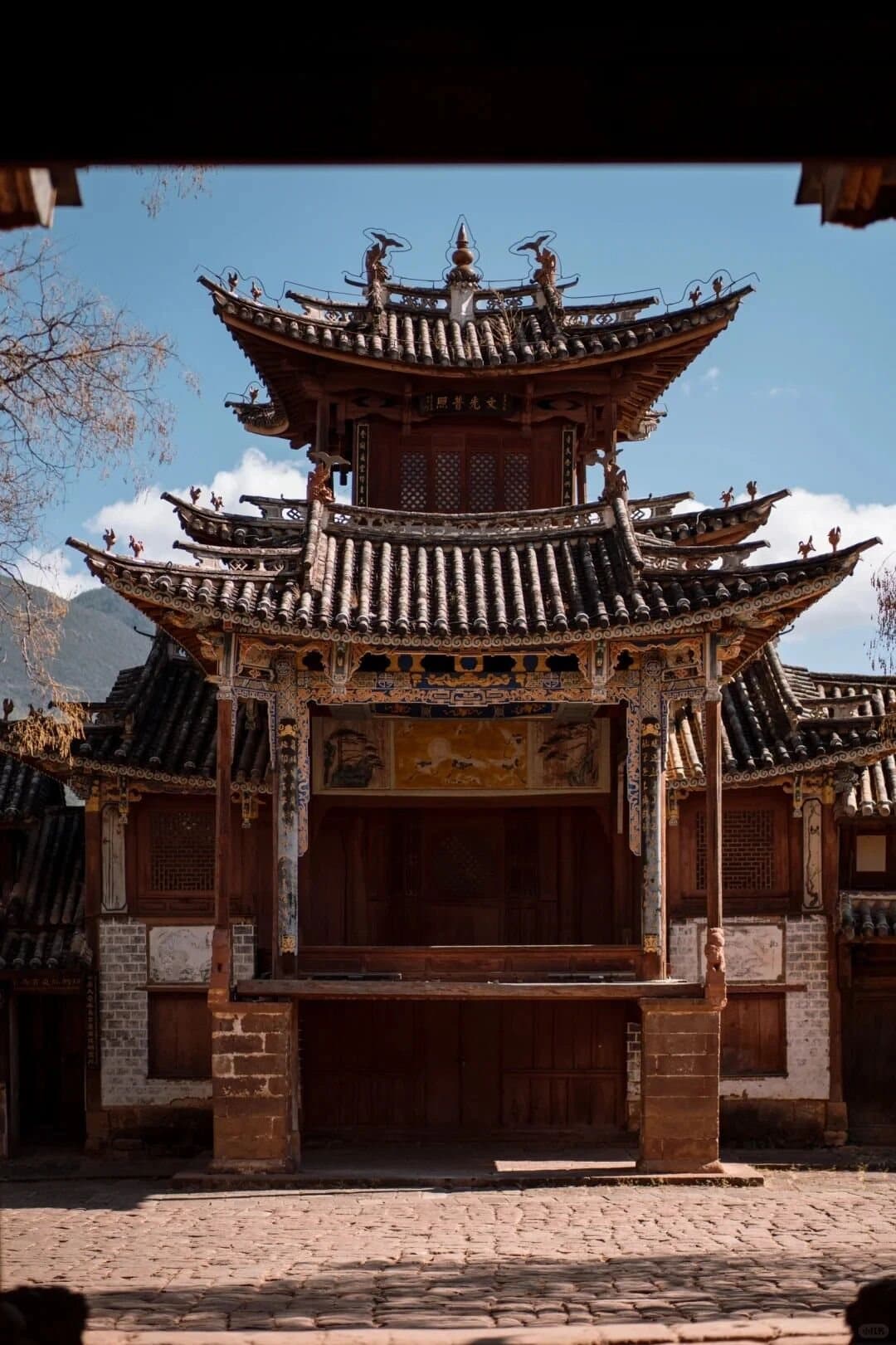 Shaxi Ancient Town — the historic theatre pavilion on Sideng Square