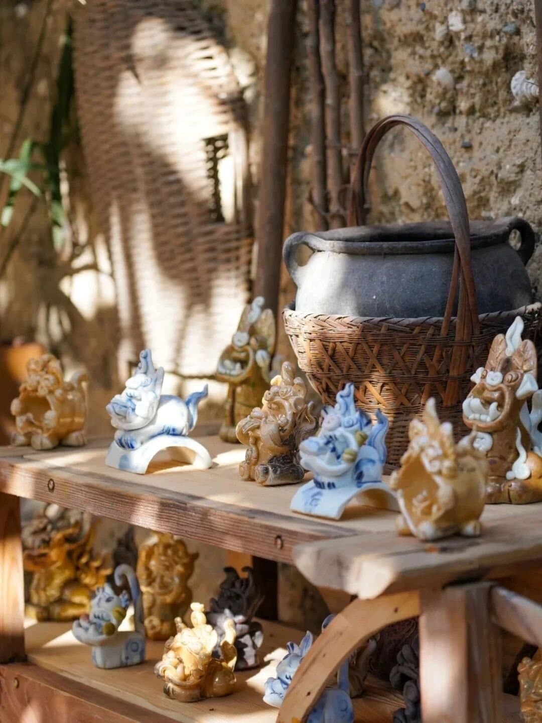 Tile Cats — a sunlit artisan studio filled with tile cats