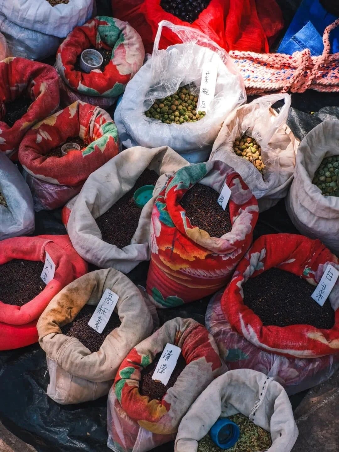 Shaxi Ancient Town — spices and dried goods at the market