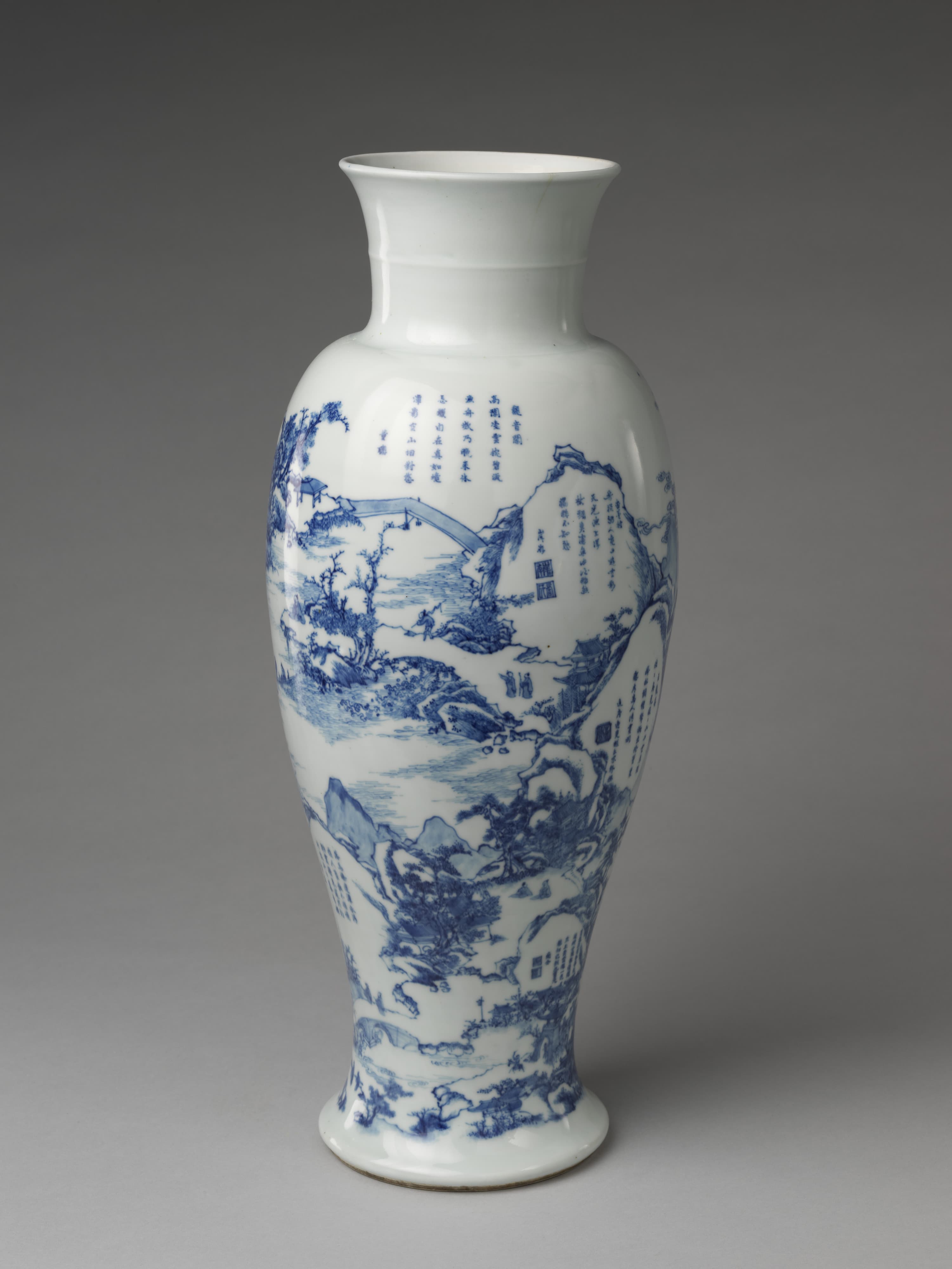 Tall Jingdezhen blue-and-white vase painted with landscape scenes and poems