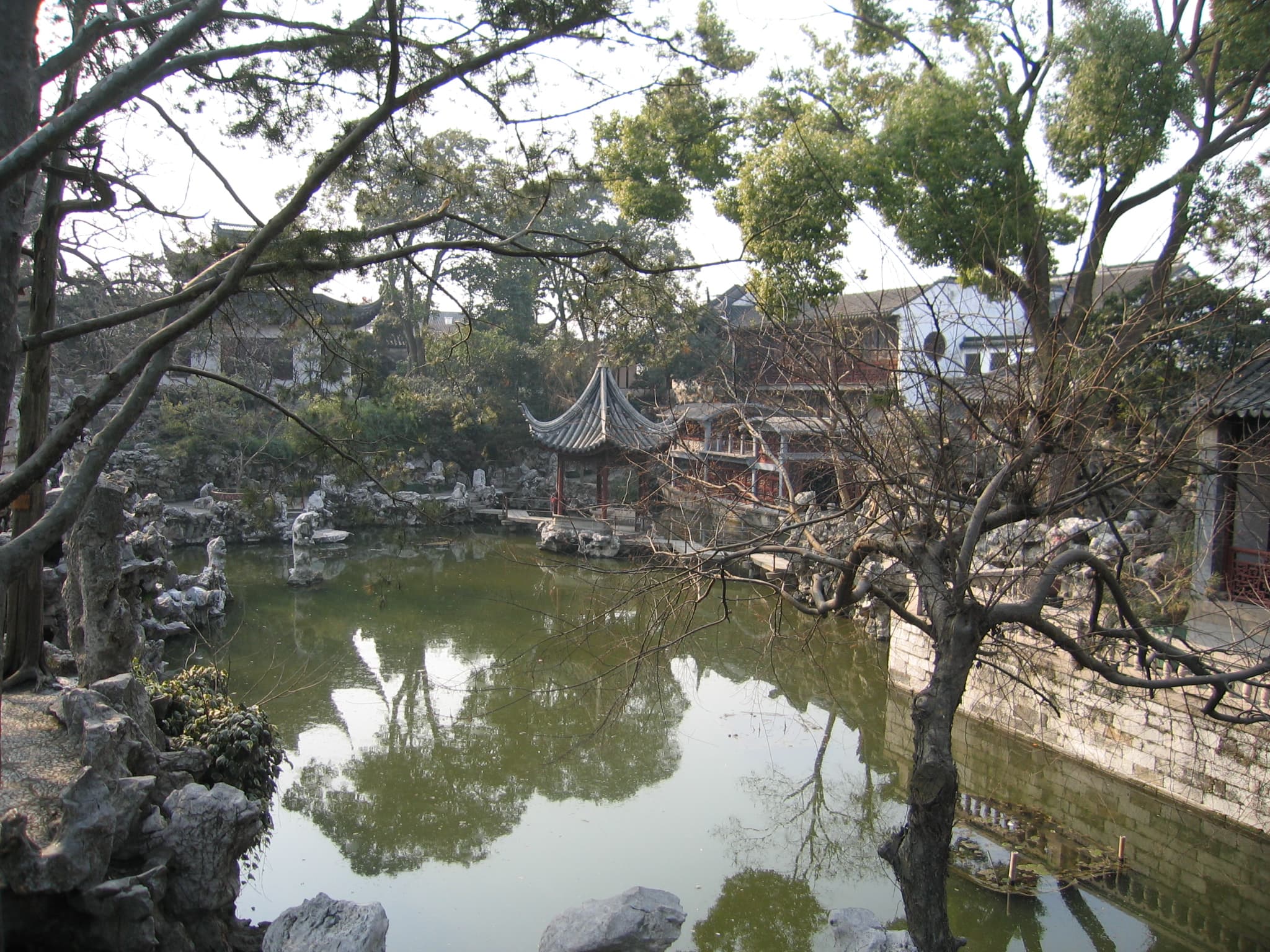 Rockery meeting water along the pond edge