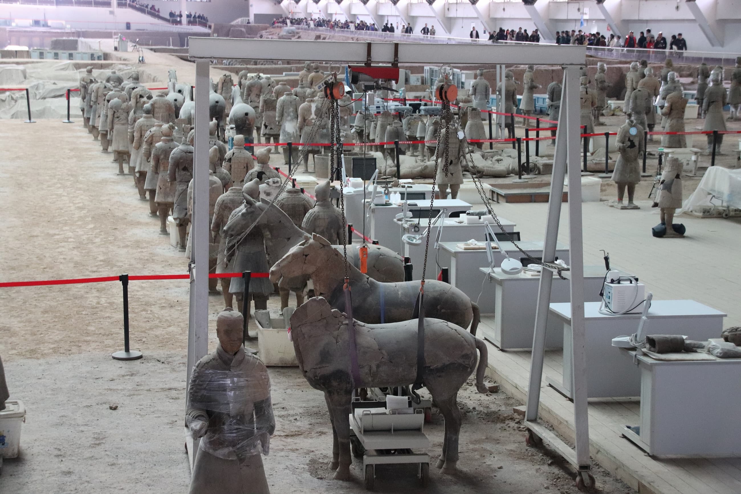 Terracotta warriors and fragments in a restoration area